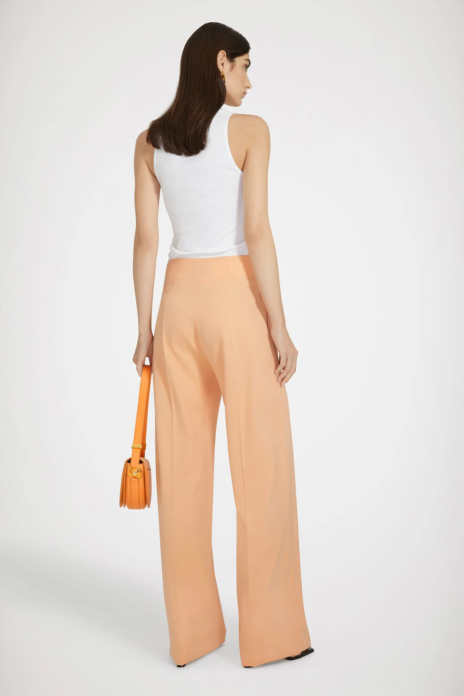 Iconic long trousers in technical wool